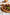 Tarte au pralin craquant, ganache au chocolat noir, caramel et fruits secs (8 parts)